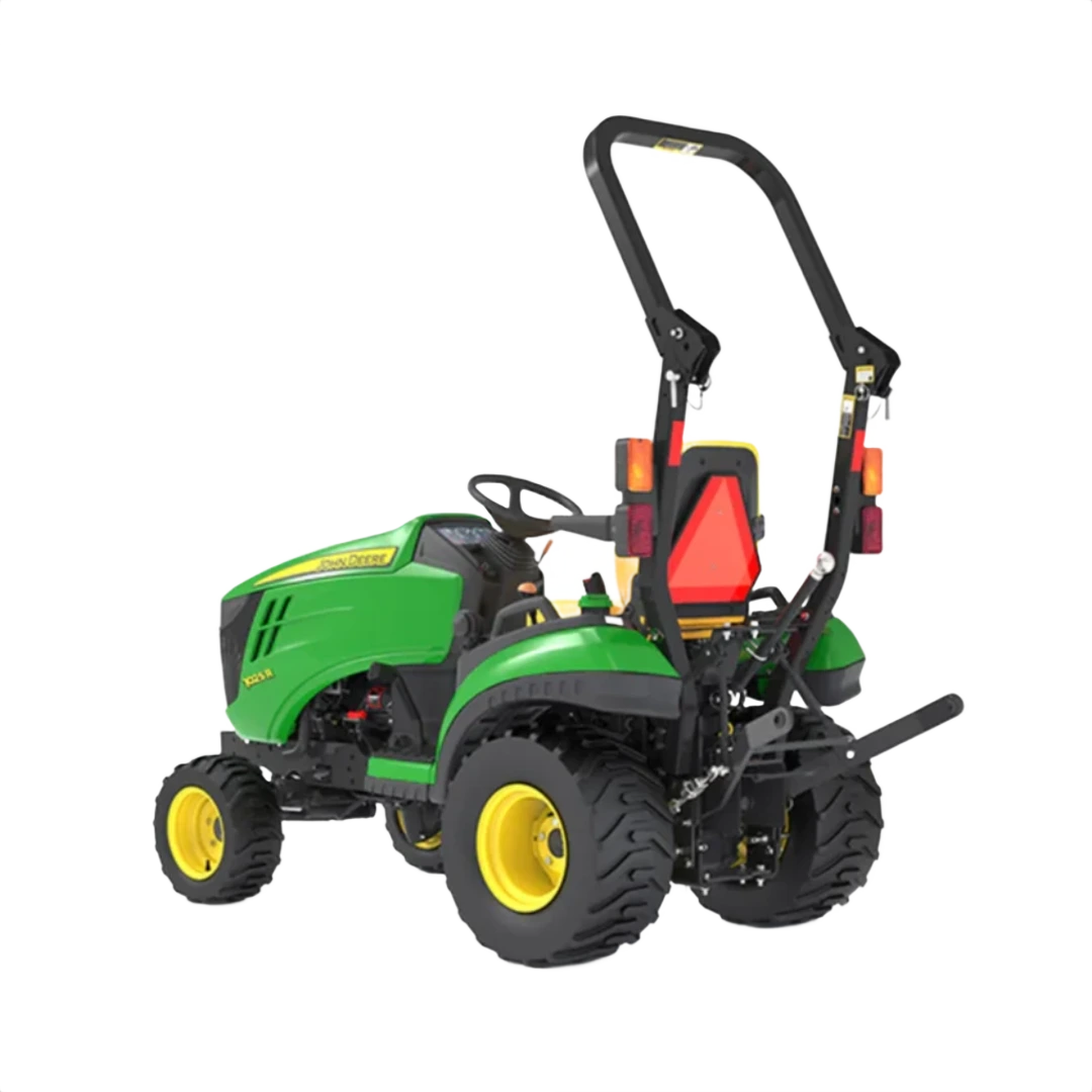 Green and yellow sub-compact utility tractor with rollover protection and wide rear tires for outdoor work tasks