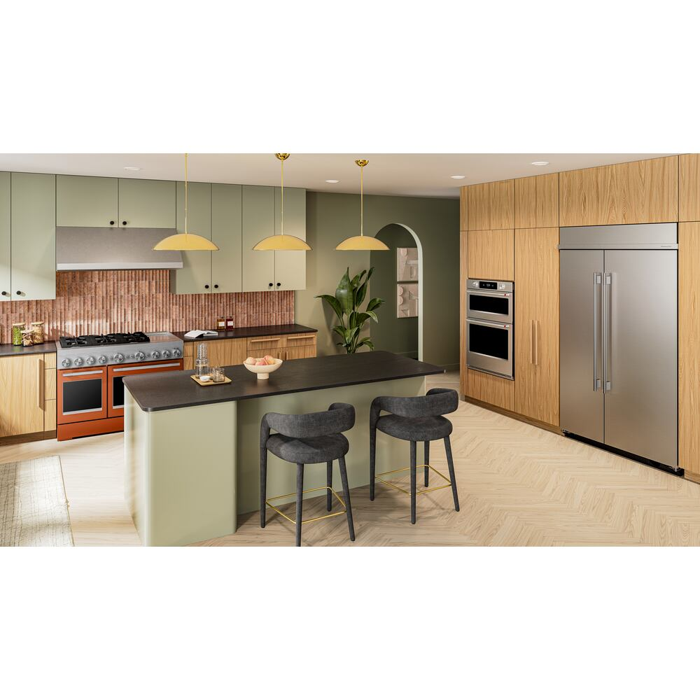 Kitchen featuring built-in 30-inch electric combo wall oven with PrintShield™ finish, wood cabinetry, and stainless steel refrigerator