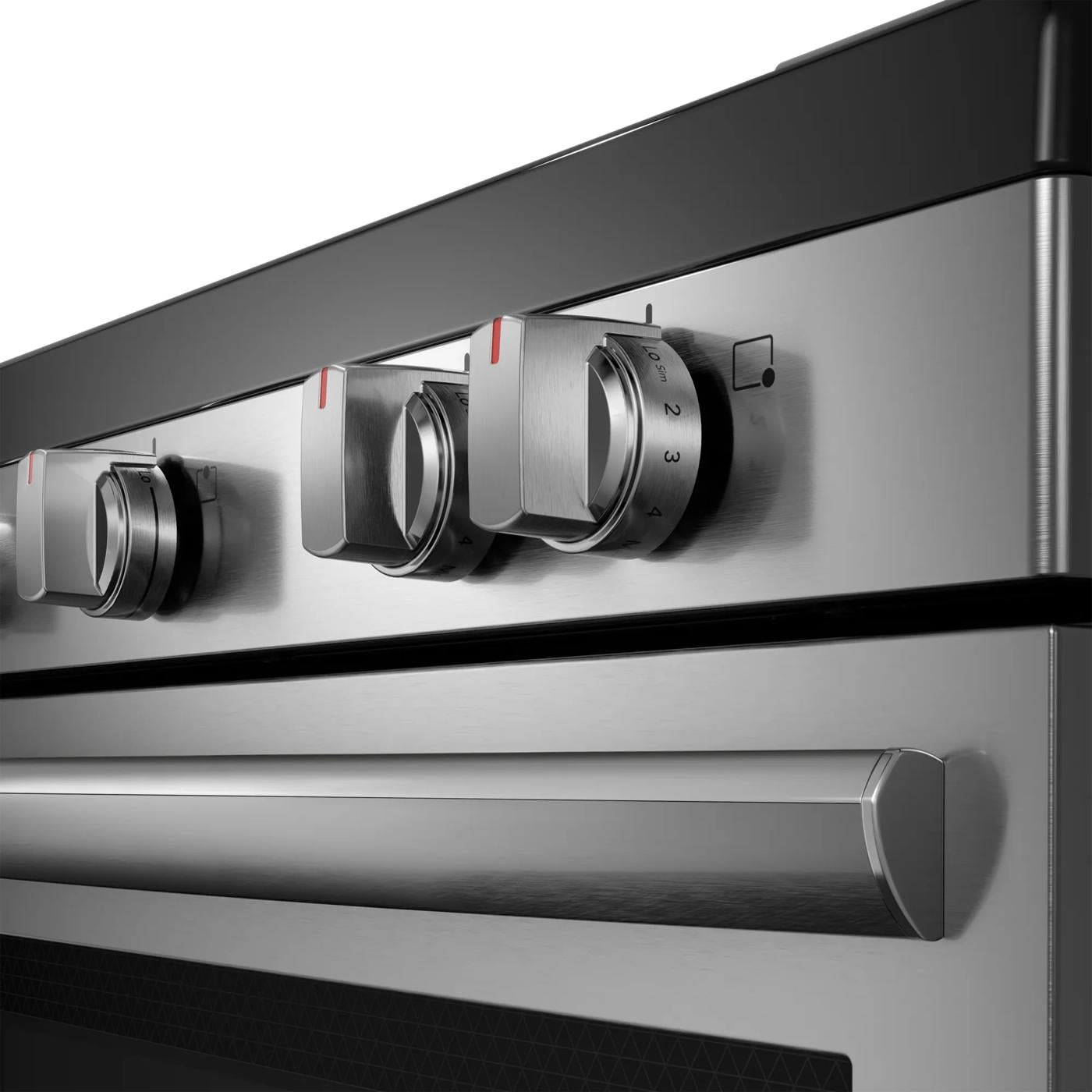 Close-up of stainless steel electric range control knobs and oven handle in kitchen appliances and ranges collection