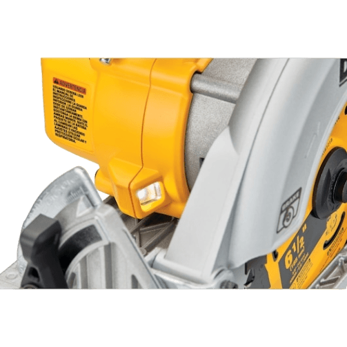 Close-up of a yellow and silver cordless circular saw focusing on the blade guard and motor housing, designed for woodworking and home improvement.