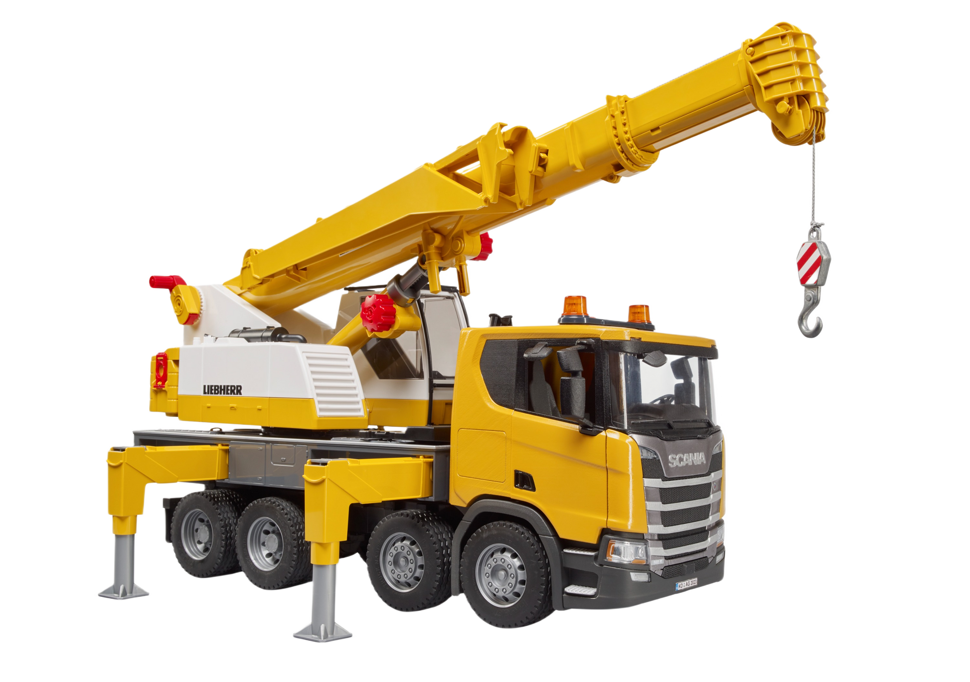 Yellow and white Bruder crane truck model with fold-out boom and realistic light and sound features in toy collections