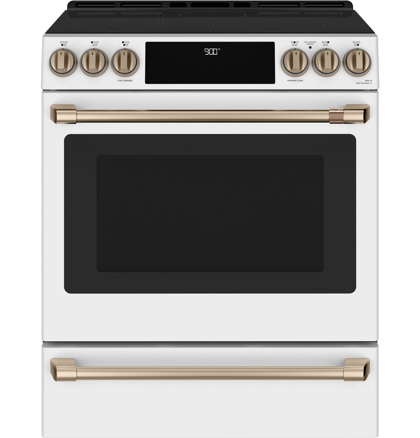 Front view of white slide-in induction and convection range with gold-tone handles and control knobs in kitchen collection