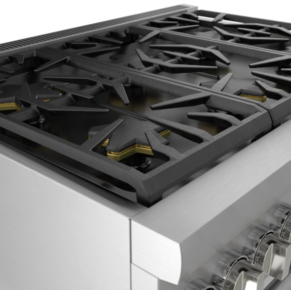 Close-up of stainless steel gas professional range burner grates with patented star-shaped brass burner caps in kitchenware collection