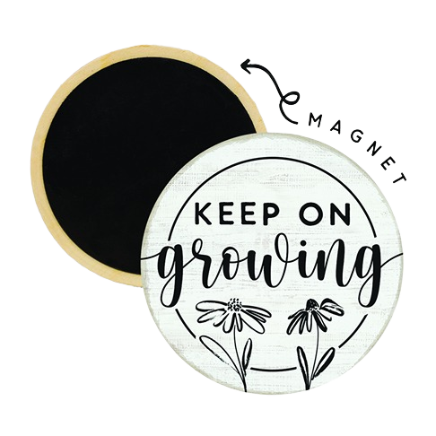 Round decorative magnet with motivational text and floral illustration in black and white design