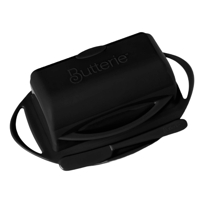 Black flip-top butter dish with integrated spreader for kitchen countertop storage and organization collections