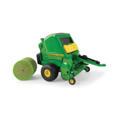Green and yellow 1:32 scale toy round baler with detailed wheels and bale for collectible display