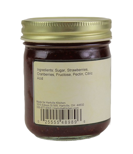 Glass jar of Hartville Kitchen Christmas Jam with gold lid showing ingredients label in jams & jellies and under $25 collections