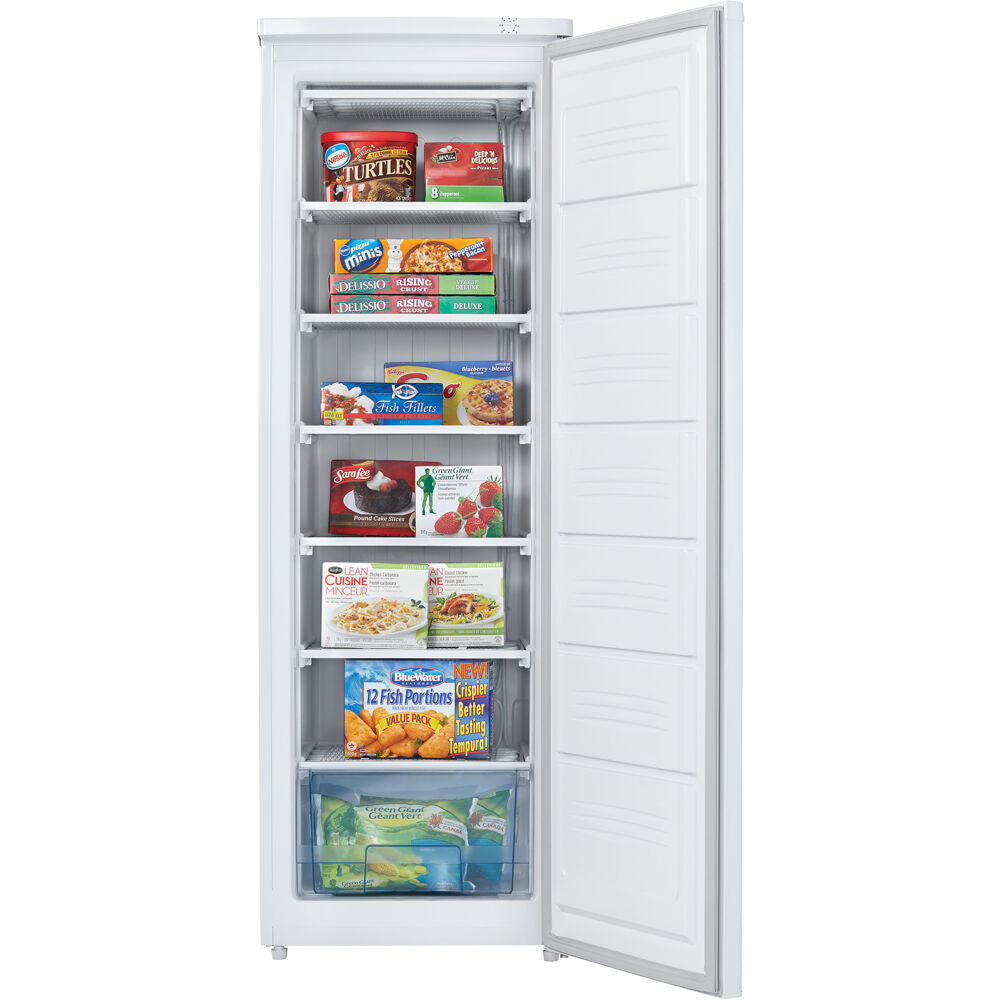 White upright freezer with open door showing organized frozen food storage in clear shelves and bottom drawer for home use