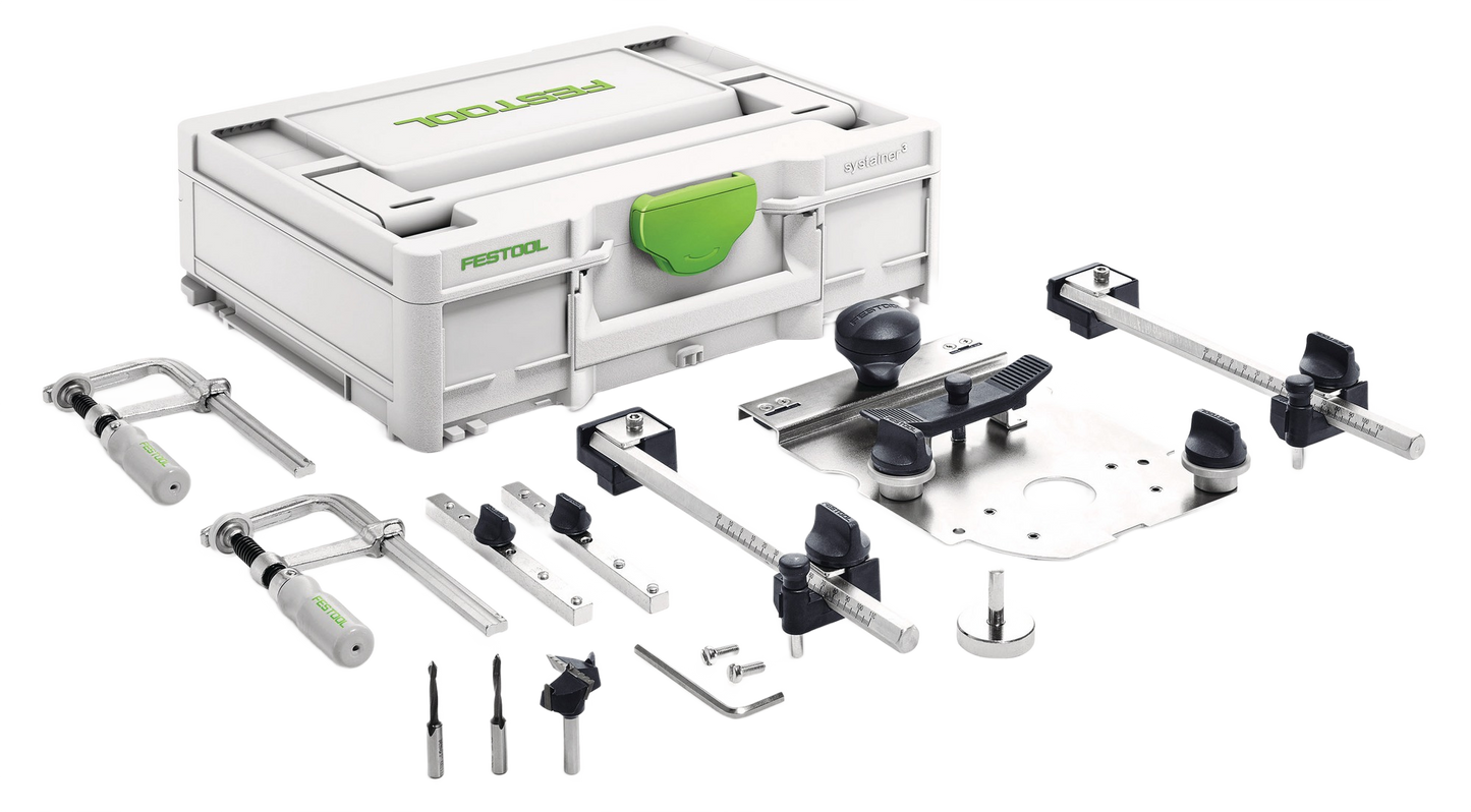 Festool hole drilling set components neatly arranged next to a white and green tool storage case for woodworking projects