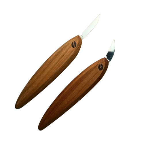 Two slim wooden-handled carving knives with sharp precision blades for detailed woodworking and home improvement tasks