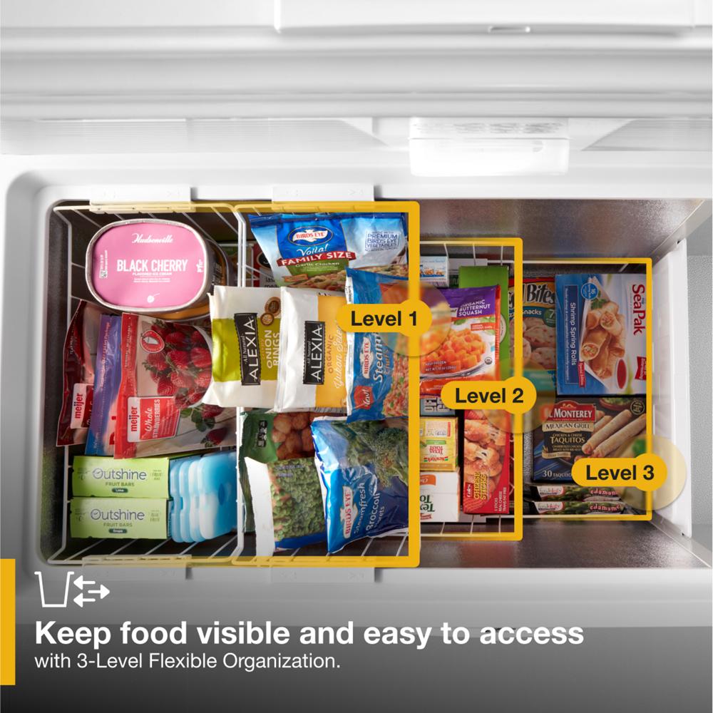 Top view inside chest freezer featuring three storage levels with organized frozen foods and ice cream from Freezers collection