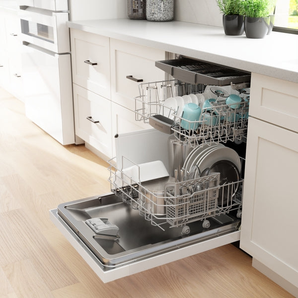 Open white 24-inch dishwasher loaded with dishes and kitchenware in modern kitchen setting