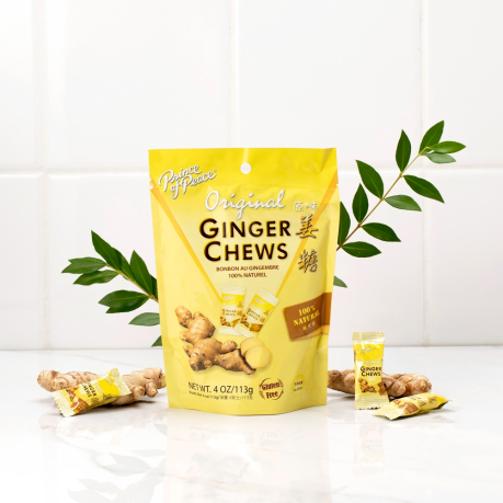 Yellow resealable bag of ginger chews with ginger root and green leaves in Candy and Food & Beverage collections