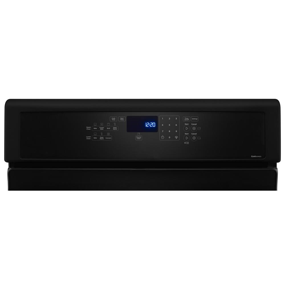 Black control panel for a gas kitchen range featuring digital clock, touchpad, and various baking, broiling, and cooking function buttons for home appliances.