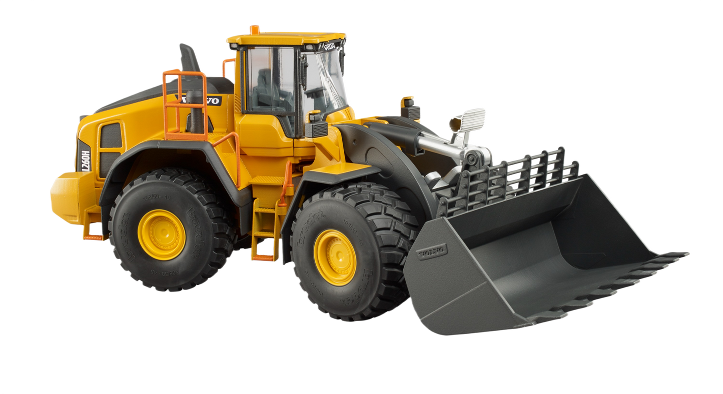 Detailed yellow Bruder wheel loader toy with movable bucket and large black tires for construction play