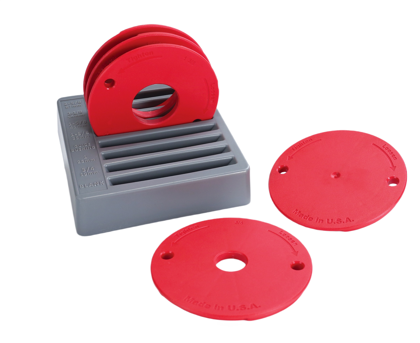Set of red and gray reducing rings in a gray holder for woodworking tool accessories and home improvement projects