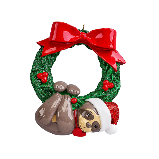Green glitter wreath ornament with red bow and a playful sloth wearing a Santa hat for Christmas décor under $50