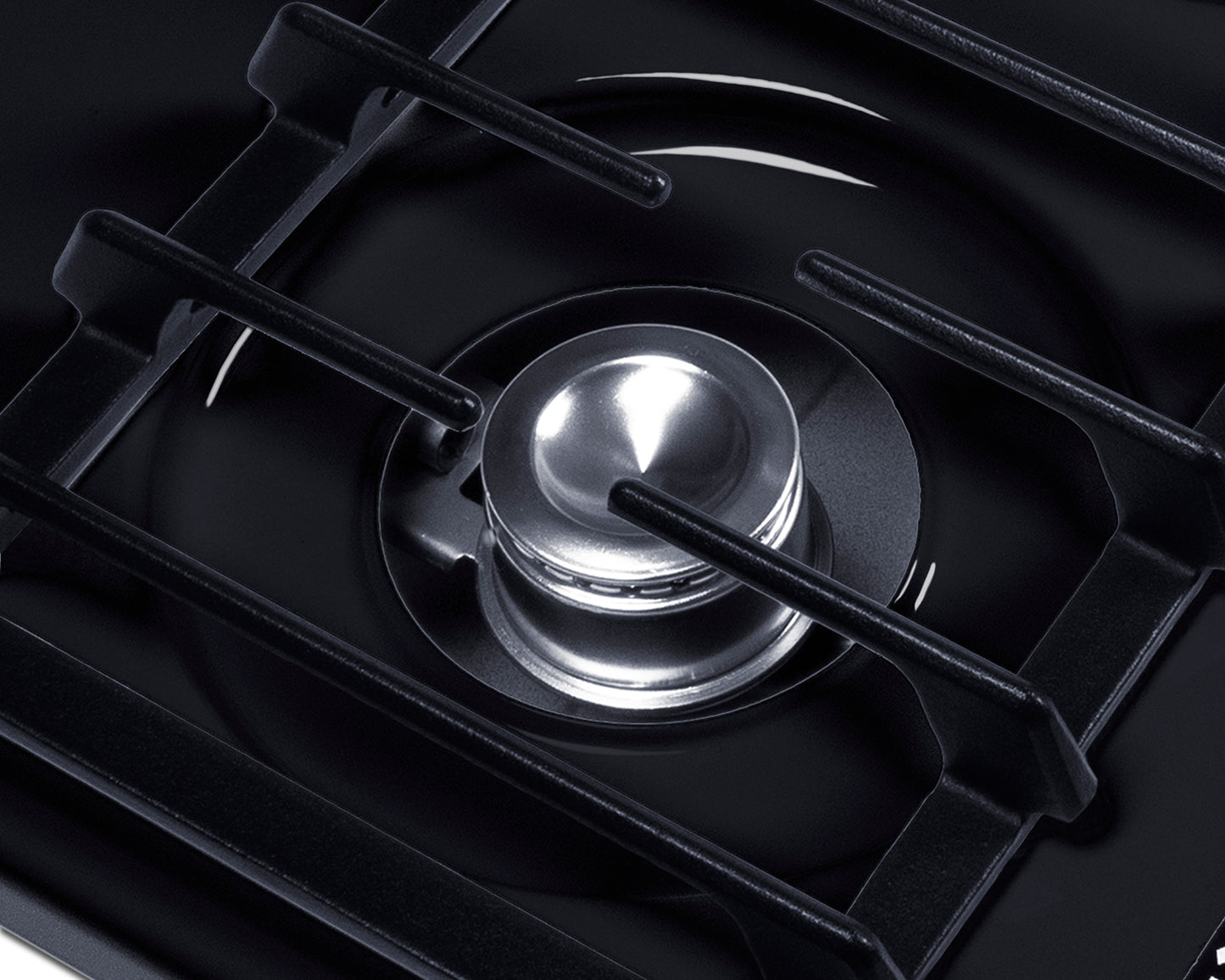 Close-up of a single burner with a shiny silver gas cap and black cast iron grate, featured in Cooktops, Gas Cooktops, and Kitchen & Kitchenware collections.