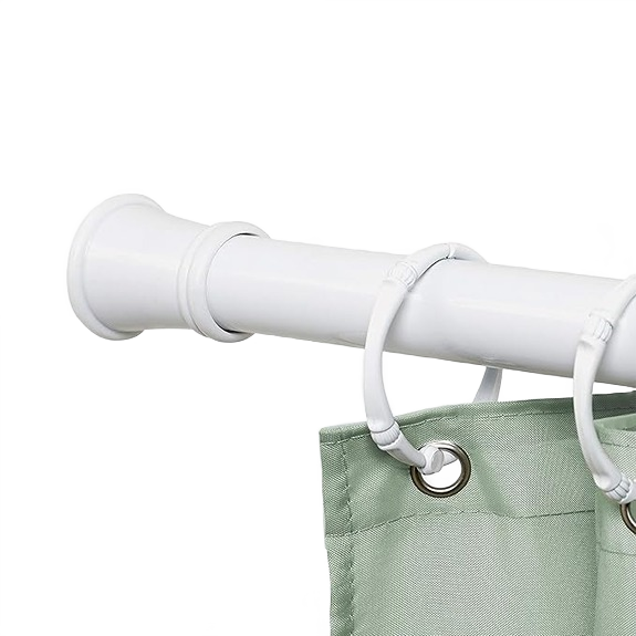 White adjustable tension shower rod with curtain rings holding sage green fabric panels for home improvement use