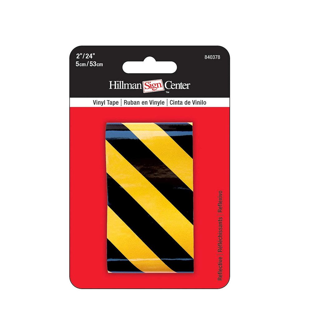 Yellow and black diagonal striped reflective vinyl tape for safety and home improvement applications
