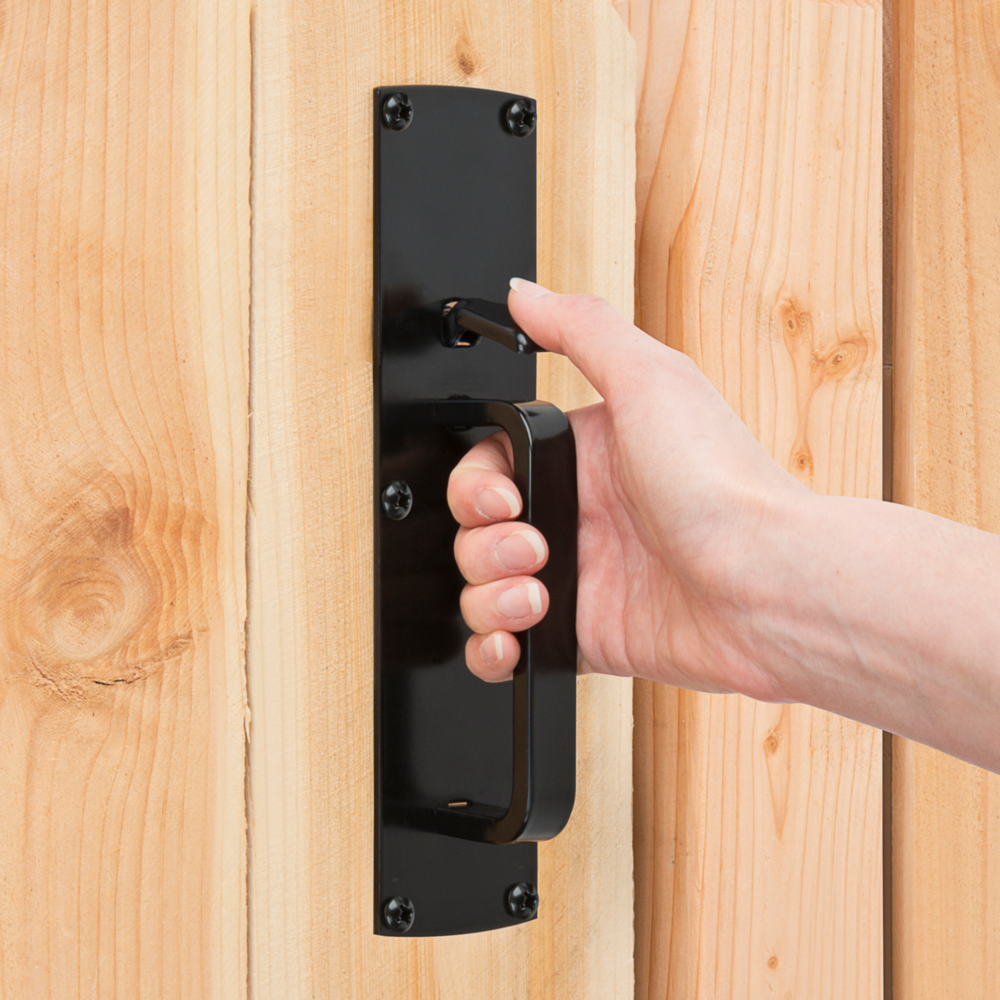 Black plated steel gate thumb latch with handle installed on natural wood gate for home improvement and gate hardware under $50
