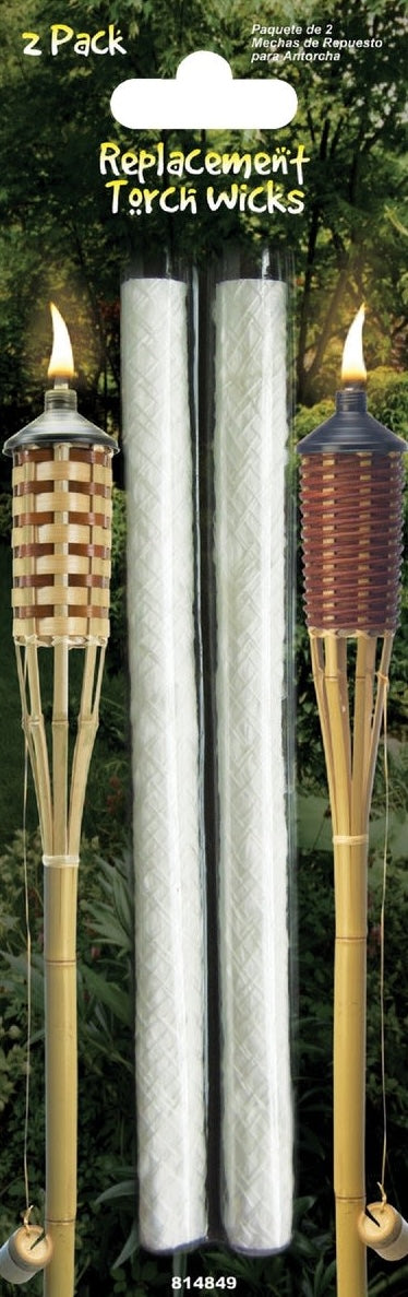 Two fiberglass replacement torch wicks displayed with lit bamboo patio torches in outdoor garden setting