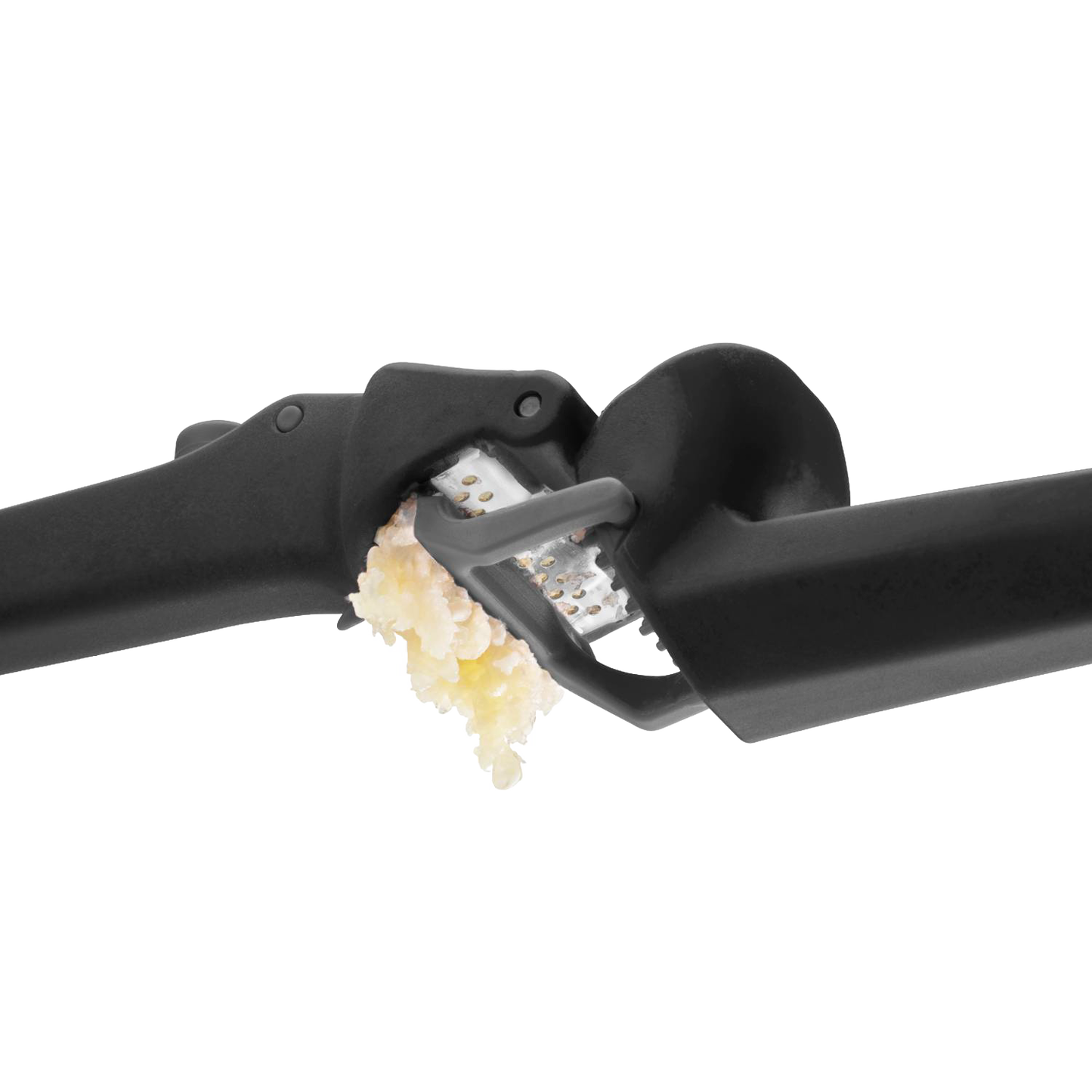 Black garlic press with ergonomic handles crushing garlic, part of Kitchen Gadgets & Tools and Cooking Utensils collections