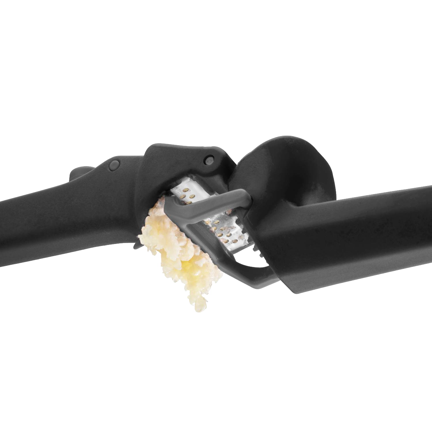 Black garlic press with ergonomic handles crushing garlic, part of Kitchen Gadgets & Tools and Cooking Utensils collections