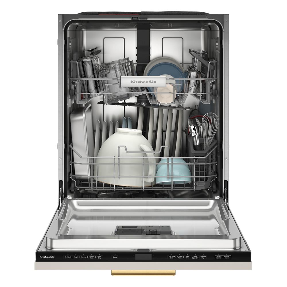 Open panel-ready dishwasher filled with plates, cups, and utensils in KitchenAid appliances and dishwashers collection