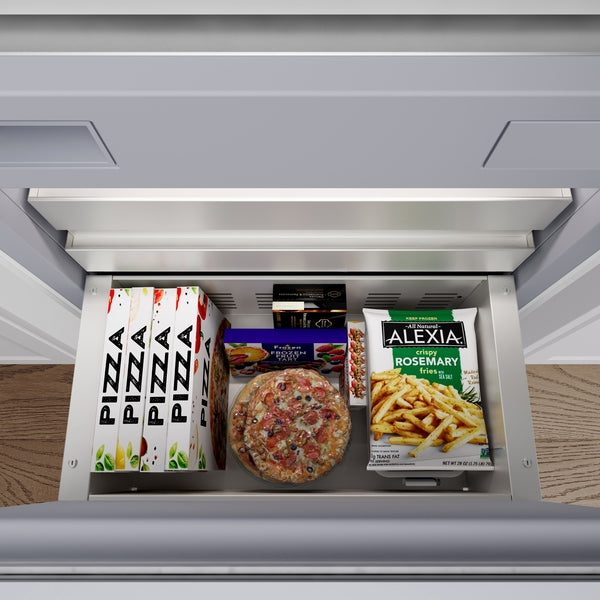 Open built-in bottom freezer drawer with frozen pizzas, rosemary fries, and assorted frozen foods from freezers collection