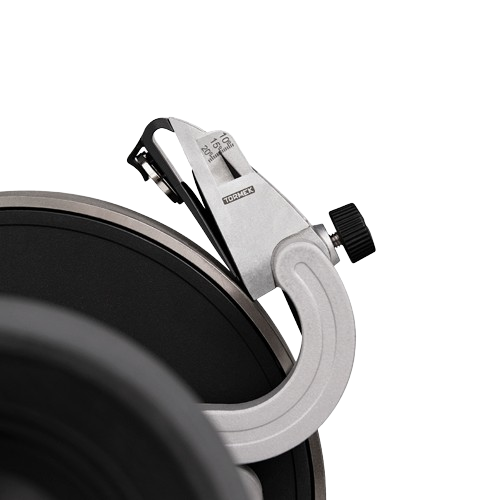 Close-up of precision metal blade holder and adjustment knob on a kitchen knife sharpener tool for home use