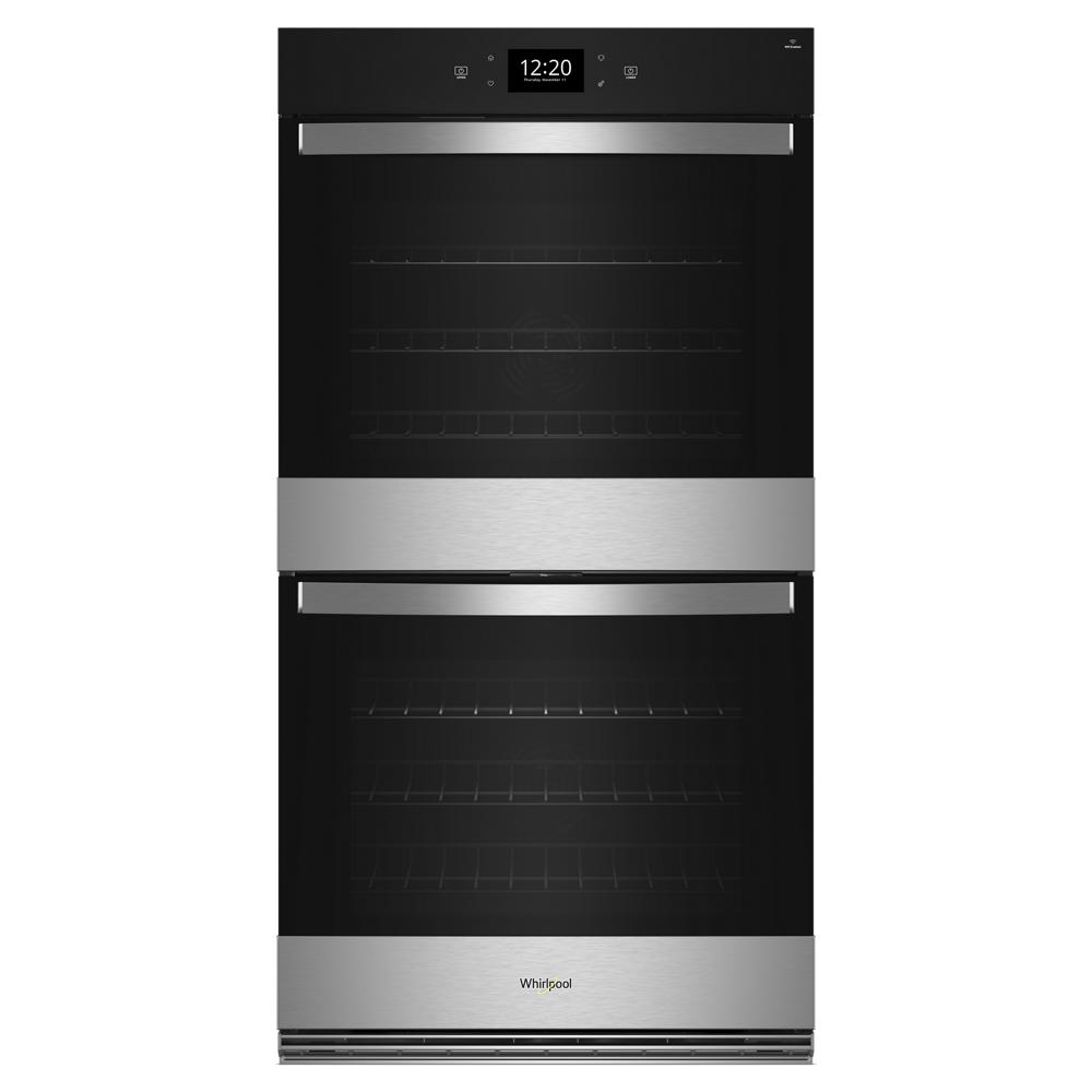 sleek black and stainless steel double wall oven with digital display and modern handles for kitchen appliances