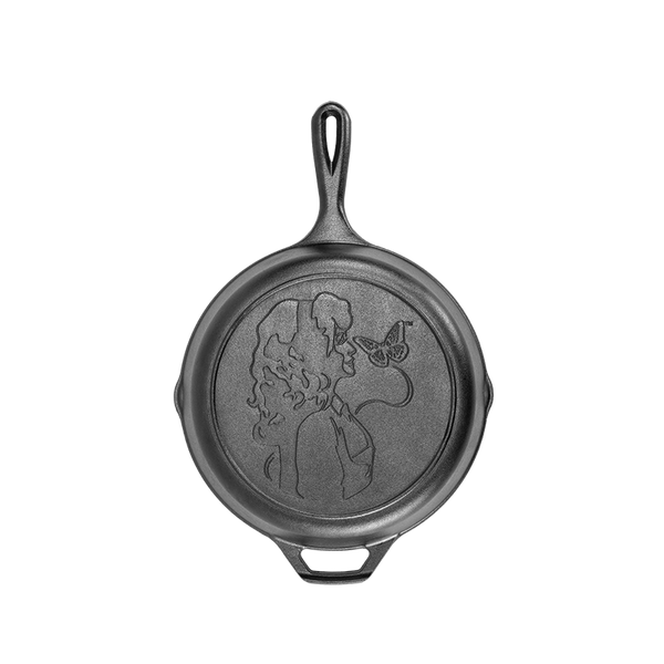 Cast iron skillet featuring embossed profile and butterfly design, part of Lodge Cast Iron kitchenware collection under $100