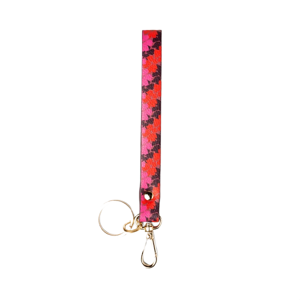 Printed vegan leather wristlet strap in red and pink hues with goldtone keyring and swivel-snap, under $50 accessory