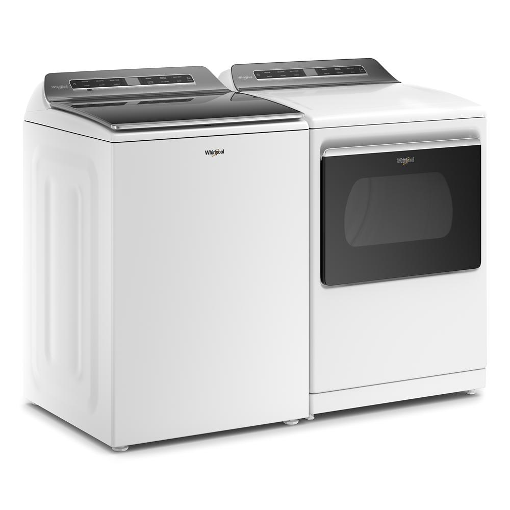 White top load washer paired with electric dryer featuring tinted door and digital control panels in laundry appliances collection