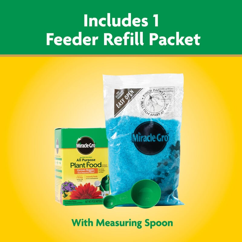 Miracle-Gro blue granular plant fertilizer refill with green measuring spoon for plant care and lawn and garden use