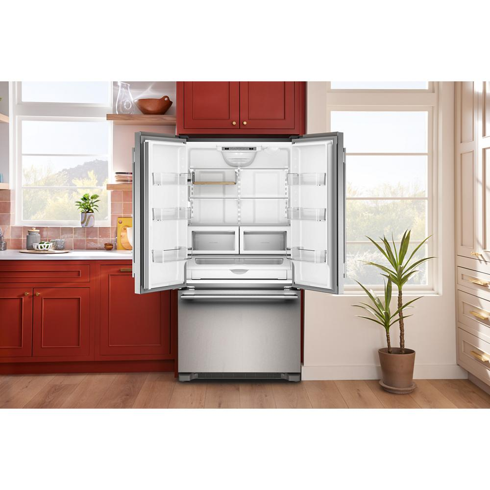 Open stainless steel counter-depth French door refrigerator with adjustable shelves and bottom freezer drawer in modern kitchen setting