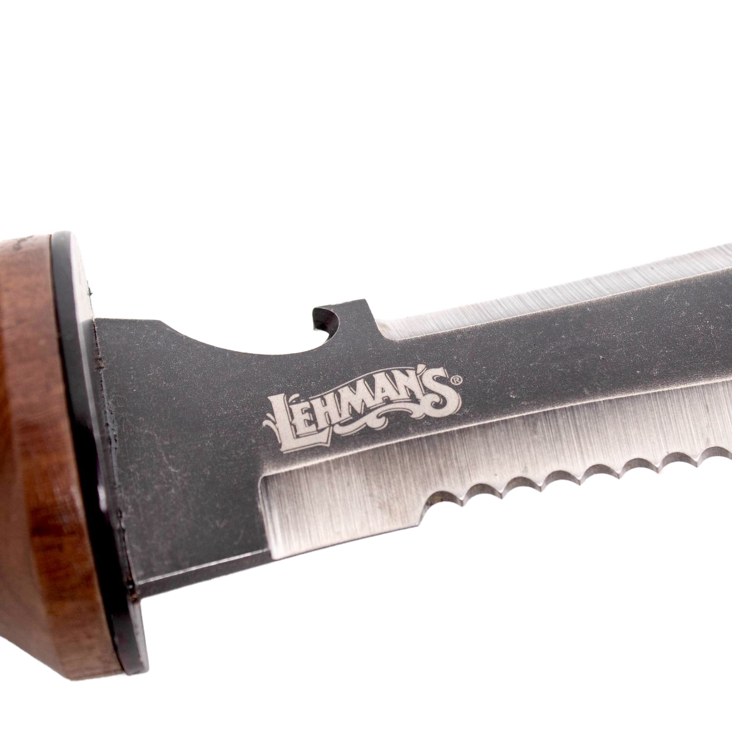 Close-up of serrated steel blade with wooden handle detail, part of a garden hand tool in outdoor and woodworking collections