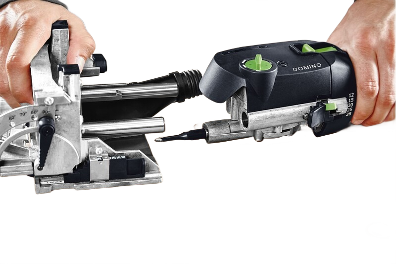 Black and silver Domino cutter tool with green accents held by two hands for precise woodworking joinery projects