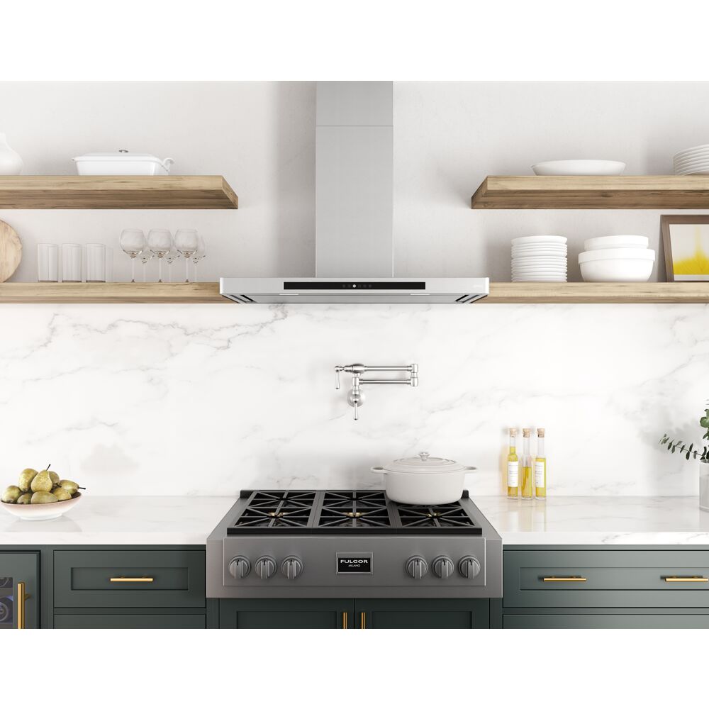 Stainless steel chimney hood with minimalist design and invisible controls above gas range in modern kitchen setting