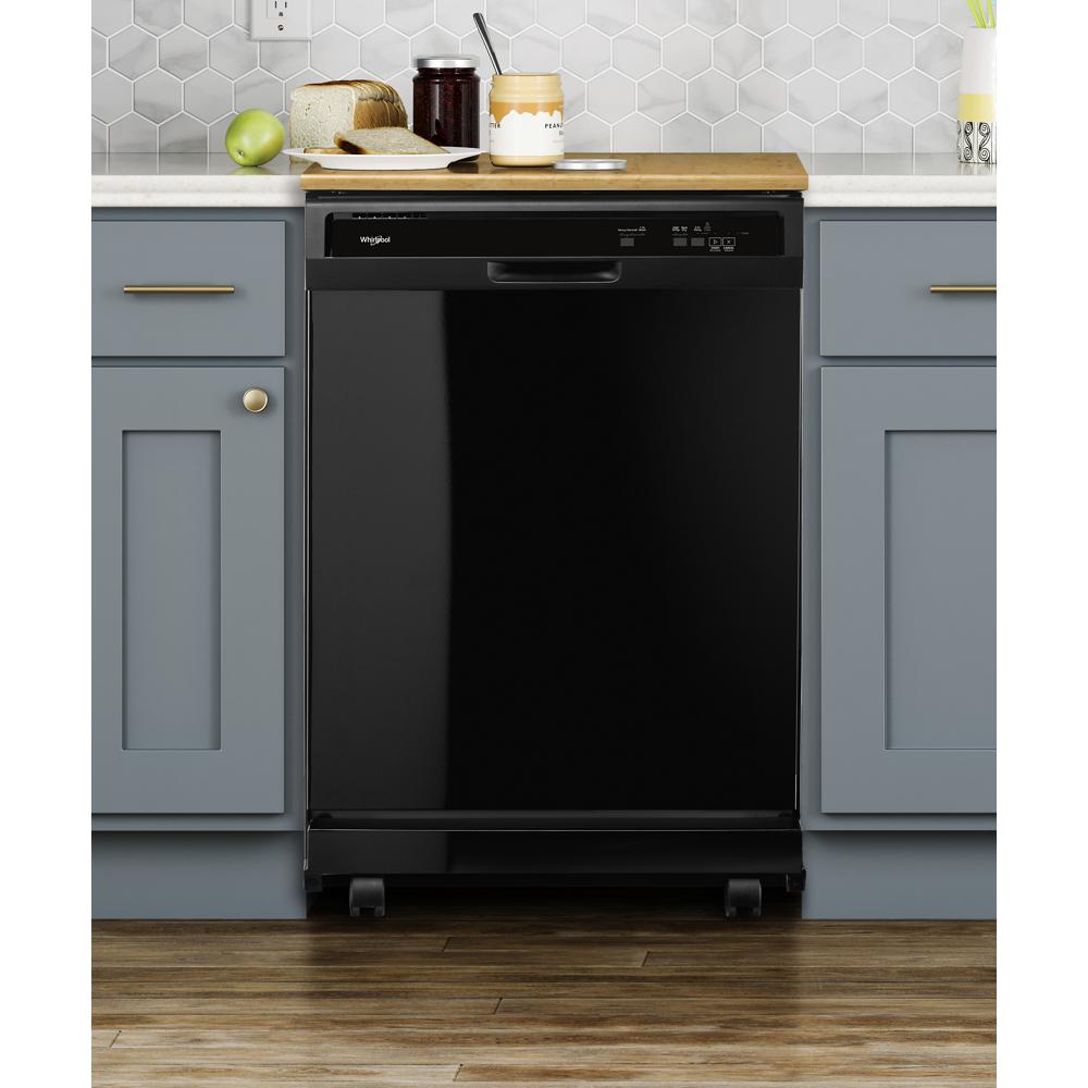 Black freestanding dishwasher with digital controls integrated into kitchen with blue cabinetry and hexagon tile backsplash