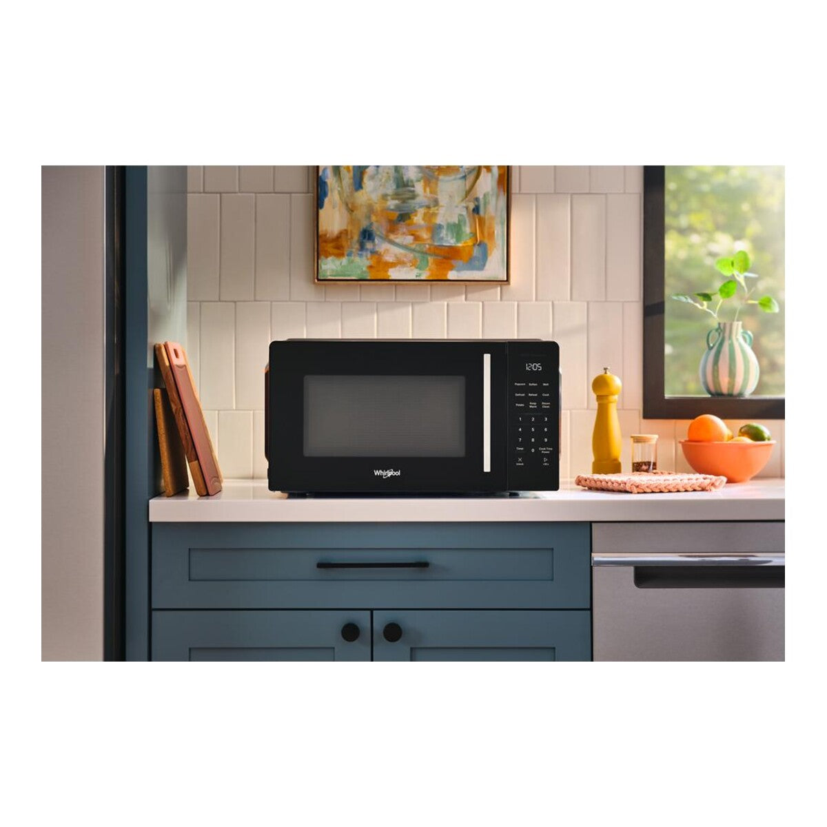 1.1 cu. ft. Stainless Steel Countertop Microwave with Sensor Cooking - 1000 watt
