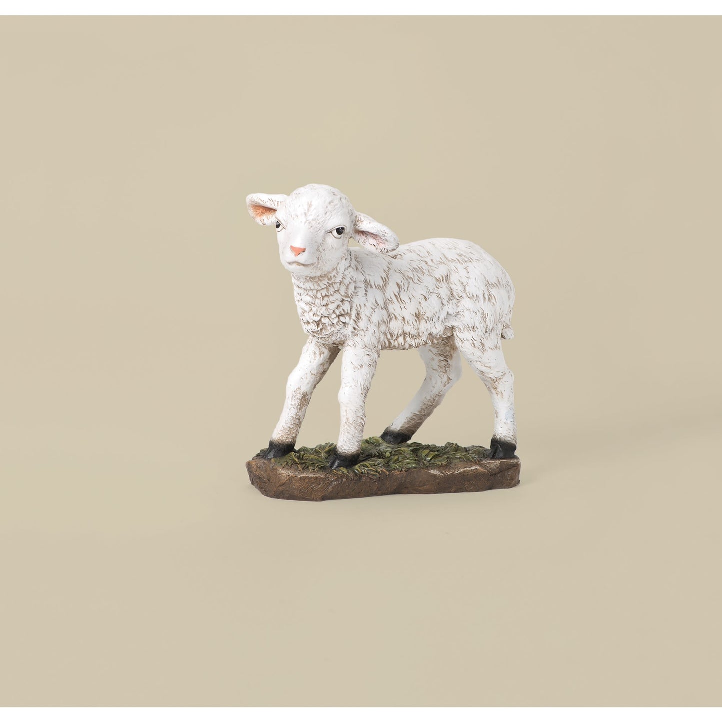 White lamb figurine standing on textured base for Christmas Nativity Scenes and holiday decoration collections