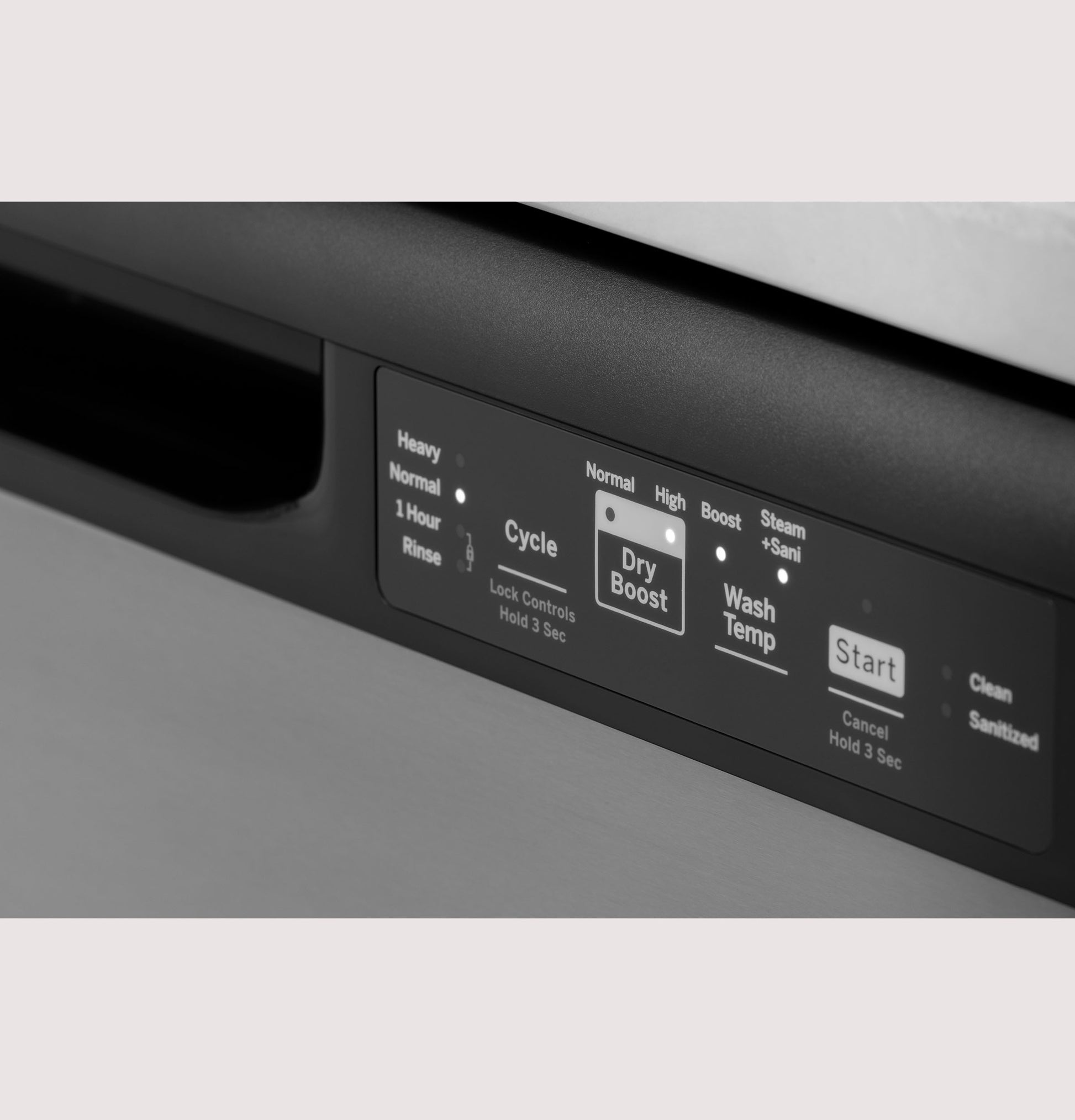 Close-up of black dishwasher front control panel with cycle, dry boost, wash temp, and start buttons in kitchen appliances setting