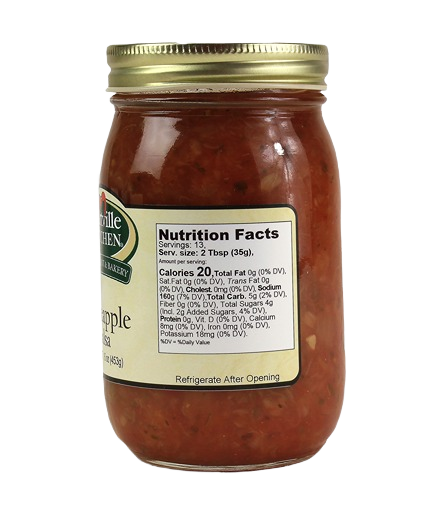 Glass jar of Hartville Kitchen pineapple salsa with gold metal lid, part of salsas and food & beverage collections