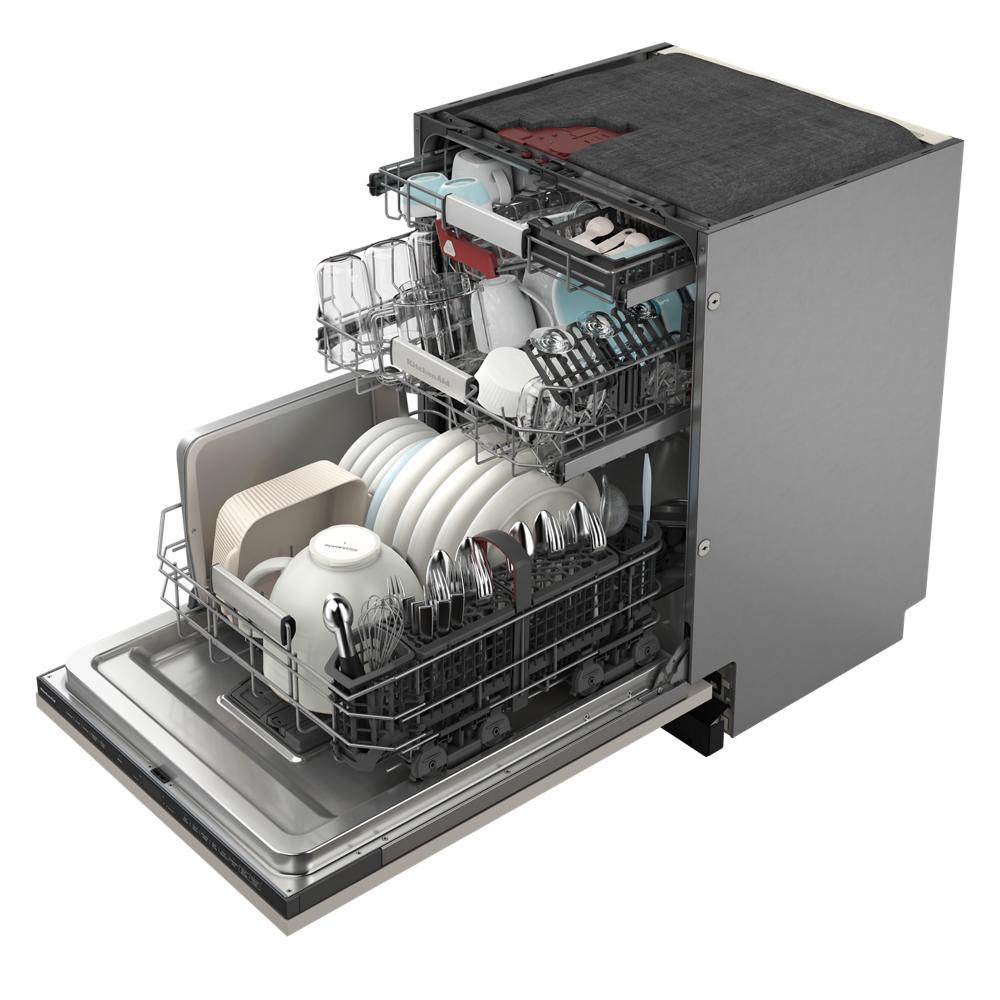 Open panel-ready dishwasher with three adjustable racks loaded with dishes and cutlery in kitchenware collection