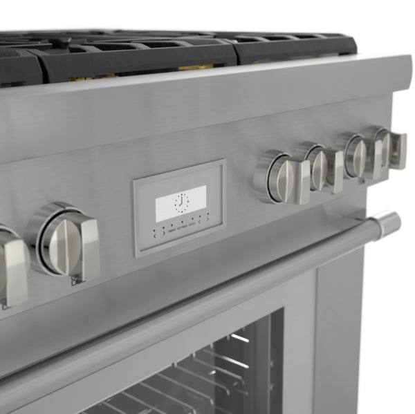 Close-up of stainless steel gas range control panel with six knobs and digital display in modern kitchenware collection