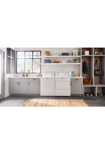 Bright laundry room with white top load washer and dryer next to gray cabinets and open shelving in appliances collection