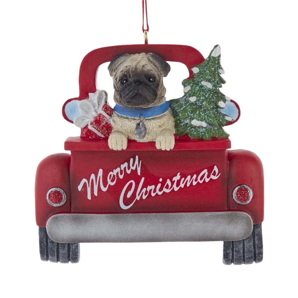 Resin Christmas ornament of pug in red truck carrying tree and gifts for festive holiday decor under $50 collections