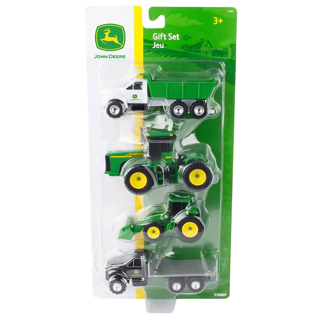 Set of four green and yellow toy John Deere farm vehicles in clear plastic packaging for children ages 3 and up